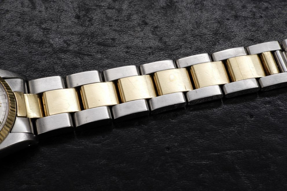 Rolex Oyster Perpetual 31 Ref. 6751 Sigma silver dial SS / Yellow Gold 18kt