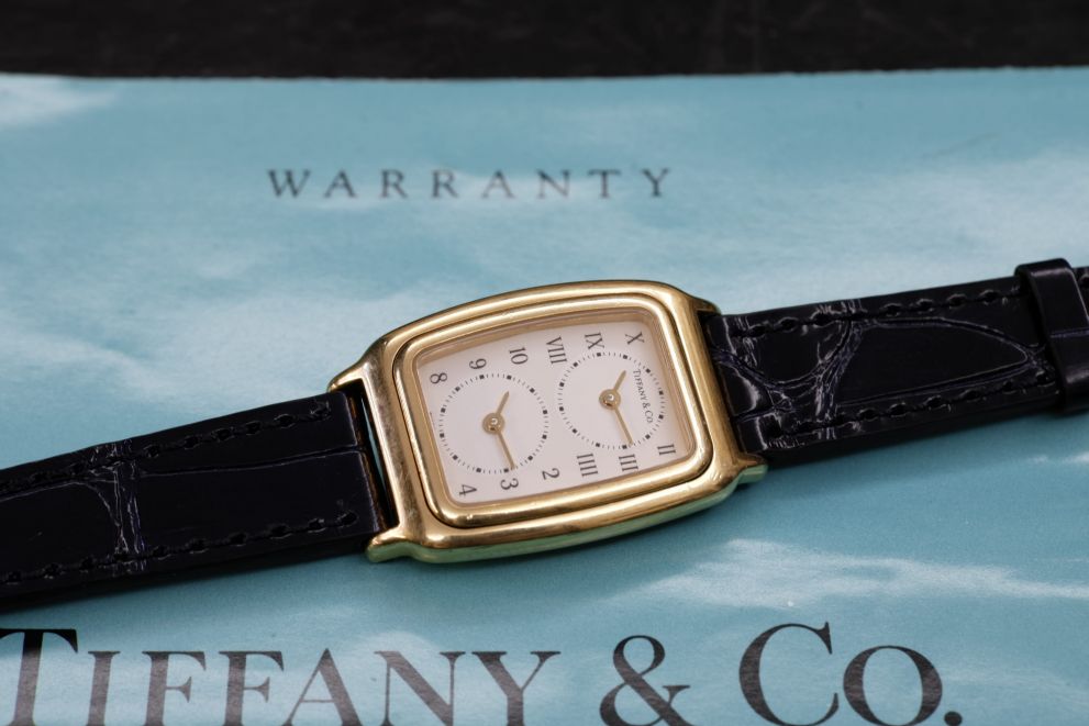 Tiffany & Co. Dual Time 18kt yellow gold Basculante - gmt - full set b/p