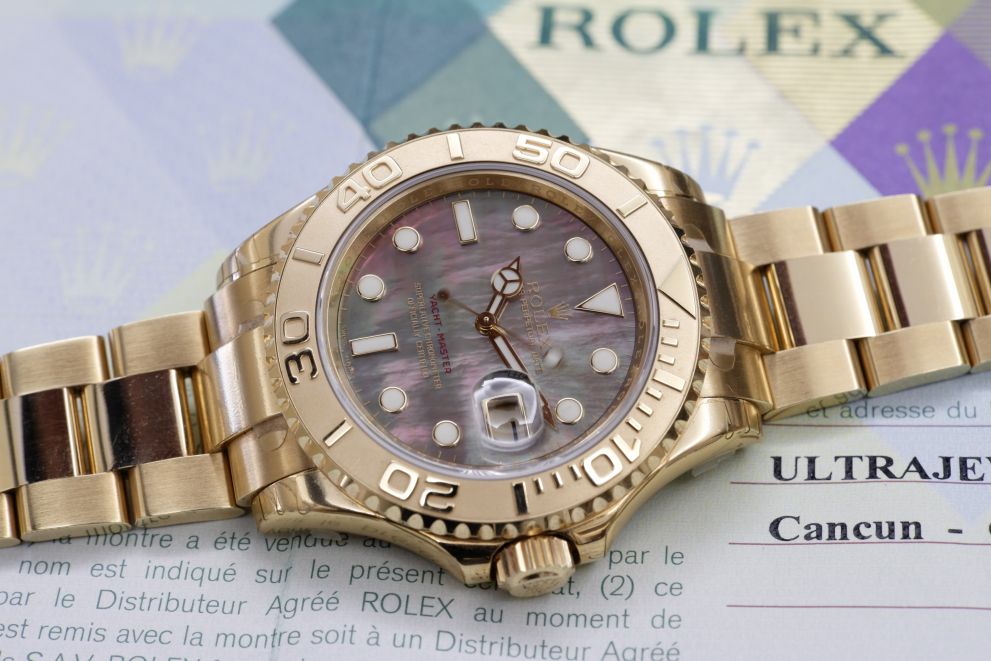 Rolex Yacht-Master Ref. 16628 NOS New Stickers Tahitian MOP Dial Yellow Gold 18kt w/papers